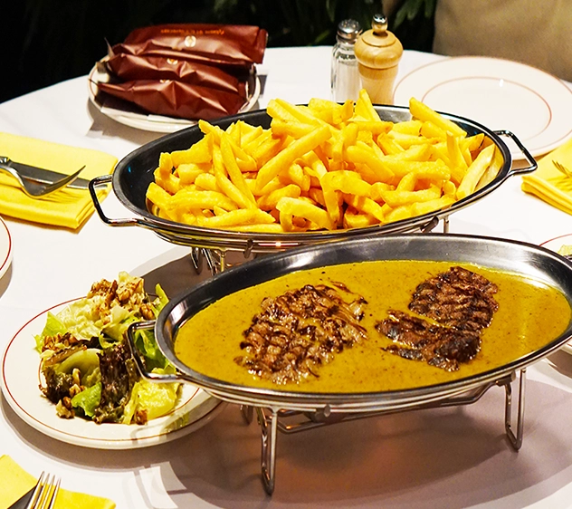 Trimmed Entrecôte Steak Porte Maillot French Fries and Green Salad with Walnuts